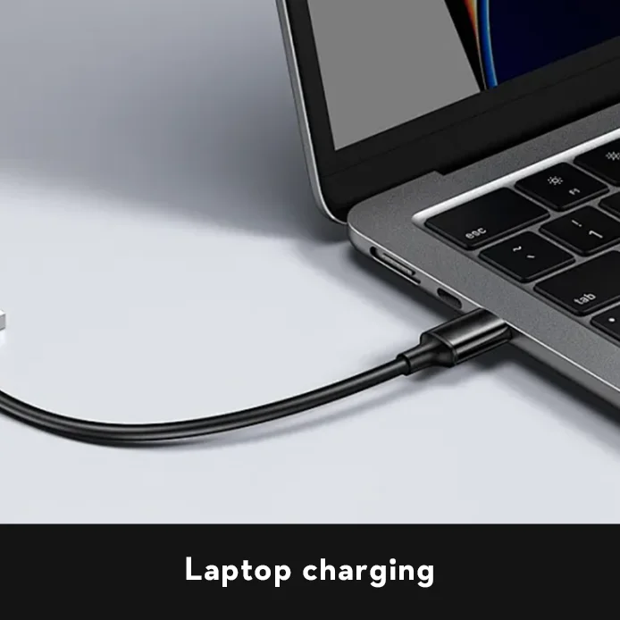 TEDGIX waterproof battery providing 100W PD fast charging to a MacBook laptop, perfect for remote work.